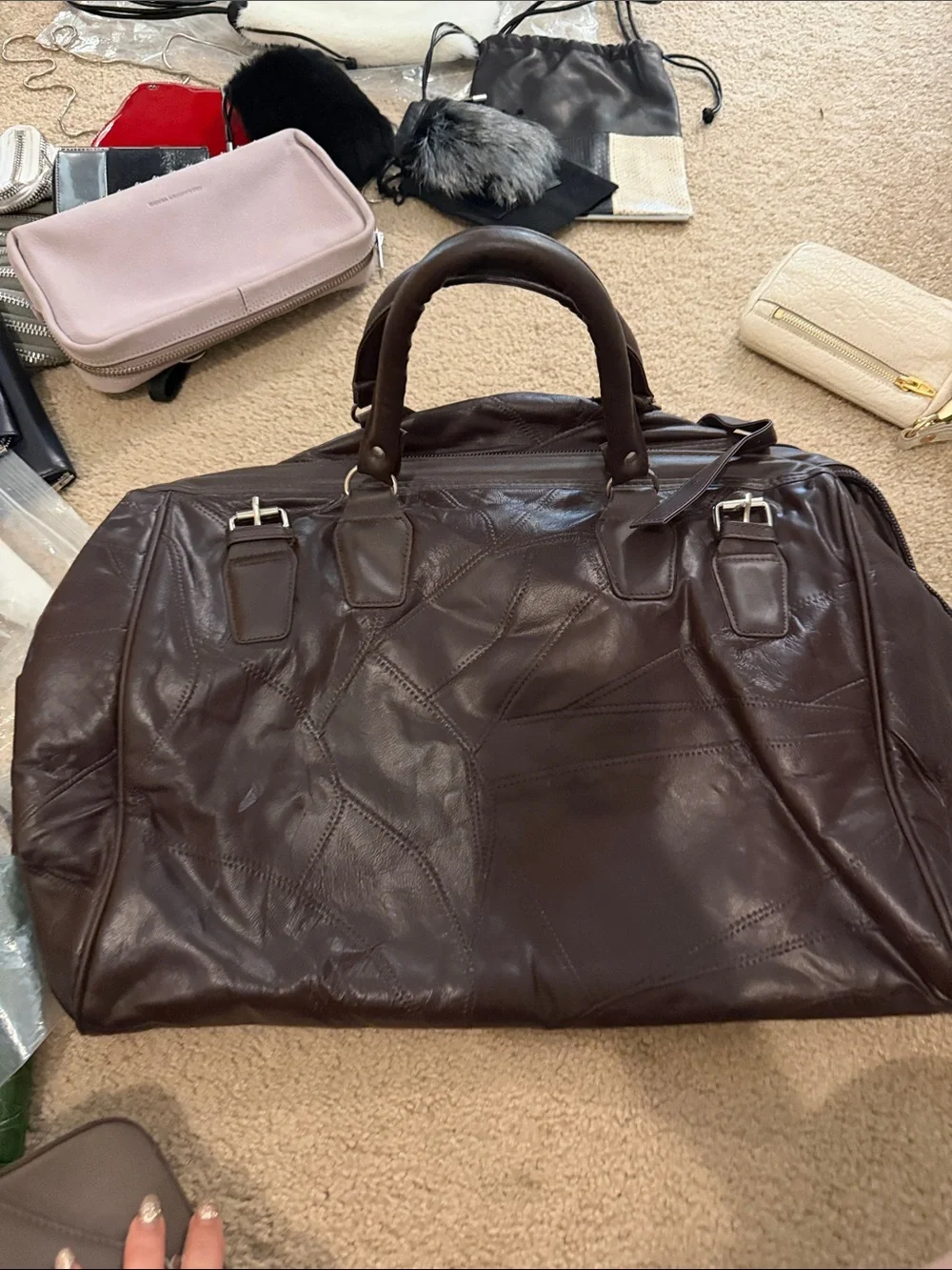 Men's Brown Leather Weekender Bag leather.